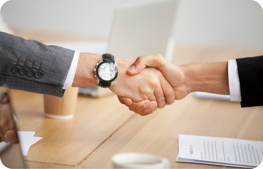 closeup-view-of-handshake-two-businessmen-in-suits-shaking-hands